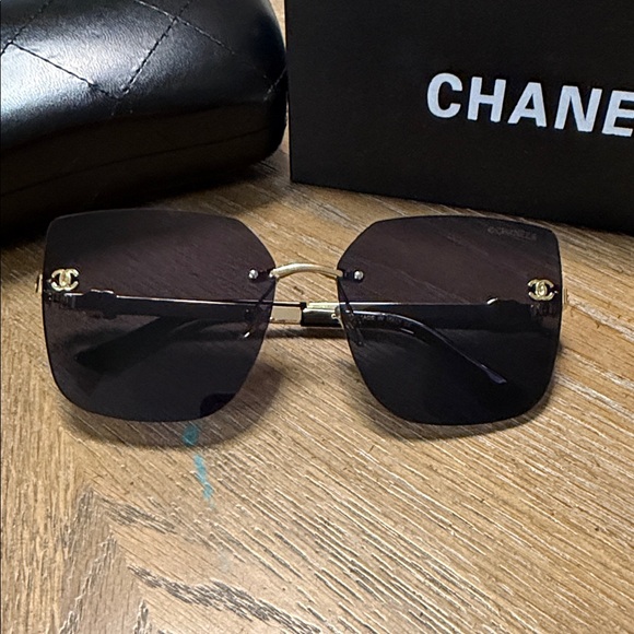 CHANEL Accessories - CHANEL Black Rimless Square Sunglasses with Gold Accents
